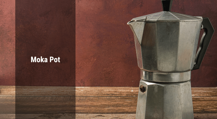 Moka pot on a wooden surface