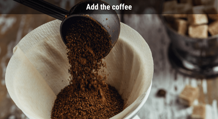 Adding ground coffee to filter placed in the Hario V60