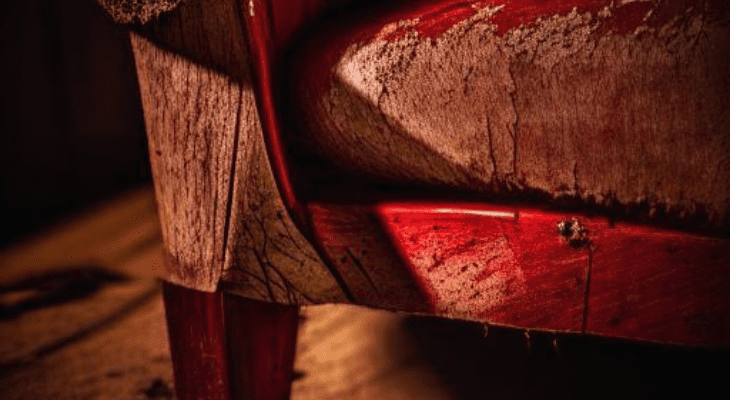 Dark brown furniture with scratches